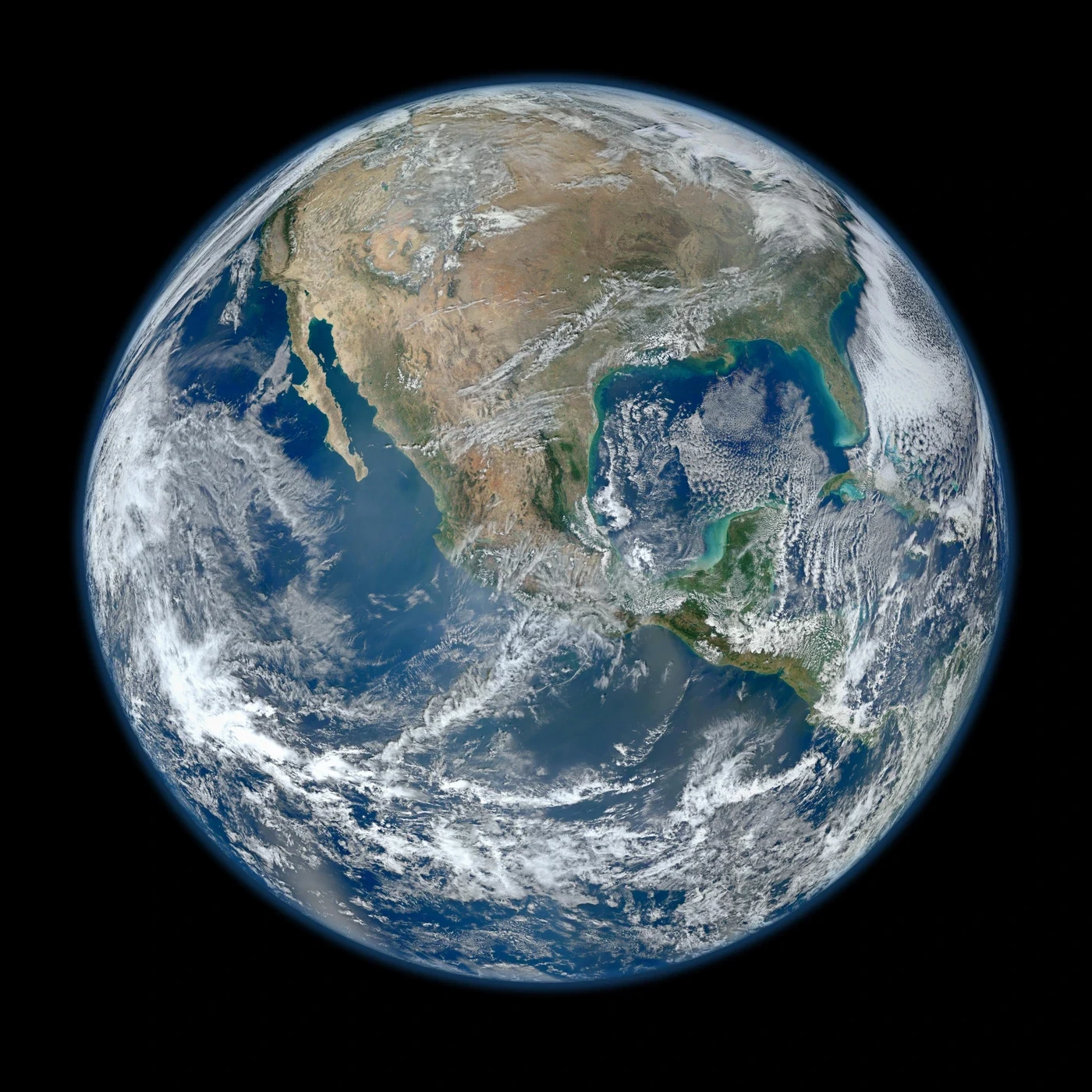 Océans bleus, nuages blancs et continents sur un globe terrestre composite